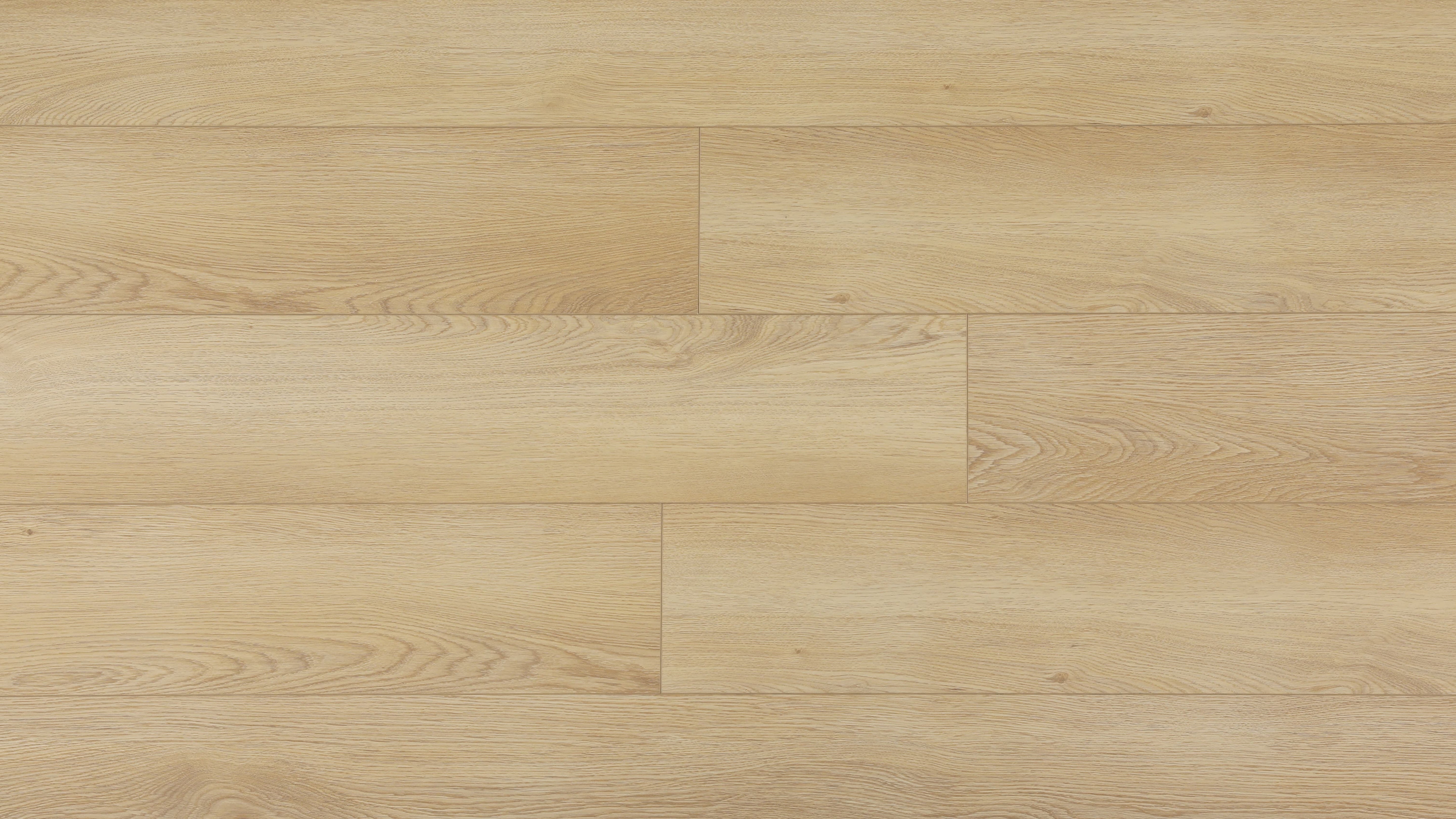 Close-up of a vinyl floor INCHE with a light brown color and visible grain pattern.