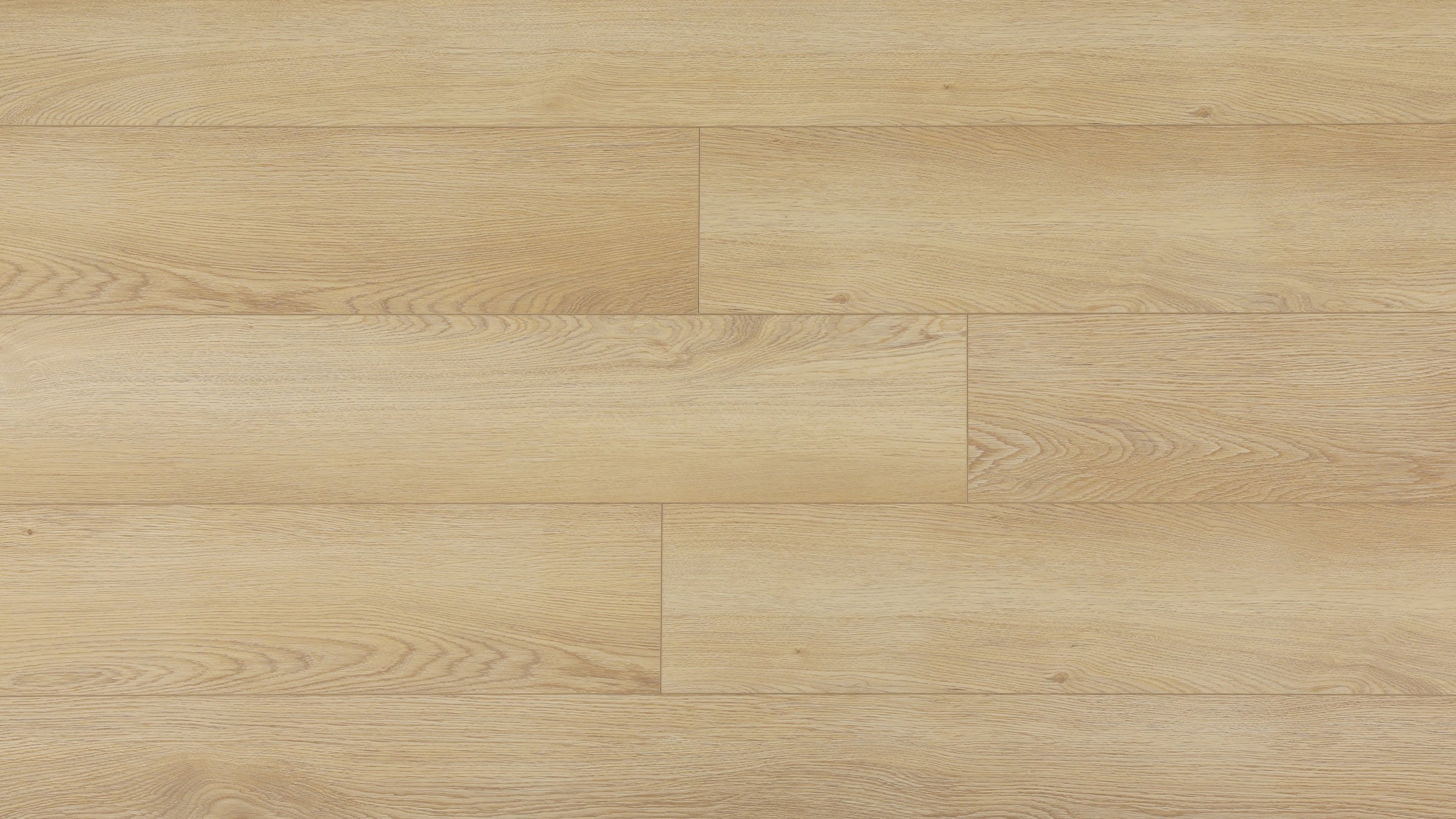 Close-up of a vinyl floor INCHE with a light brown color and visible grain pattern.
